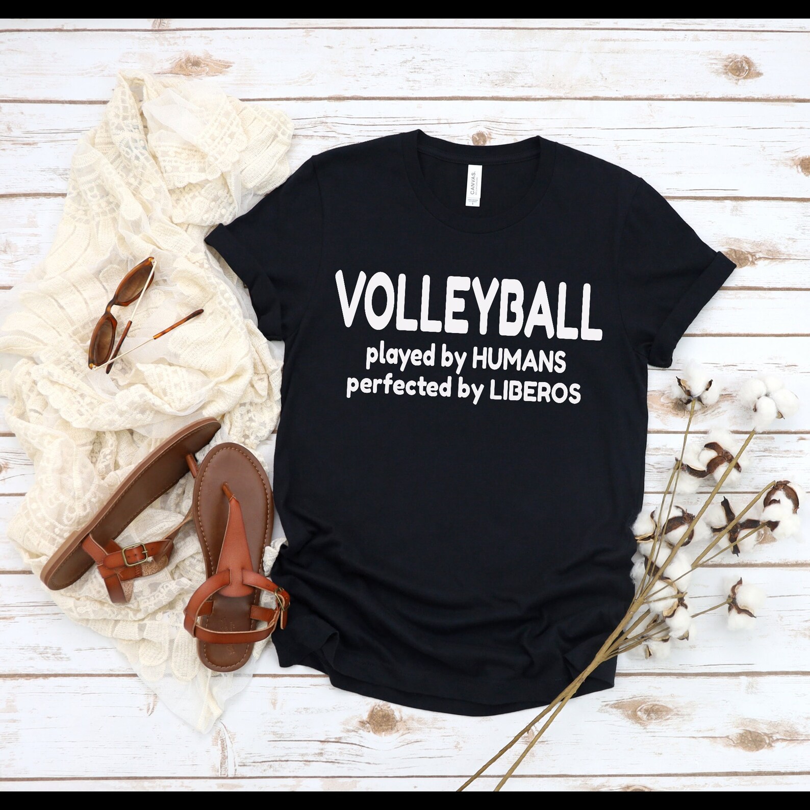 Volleyball quotes like "VOLLEYBALL Played by Humans Perfected by Liberos" are some of the motivational volleyball sayings on short and long sleeve shirts, matching oversized hoodies and wide leg volleyball pajama pj pants.